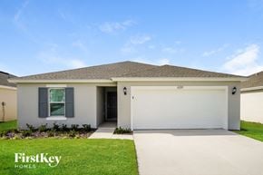 Davenport house for rent - A house with a garage door that says FirstKey Homes.