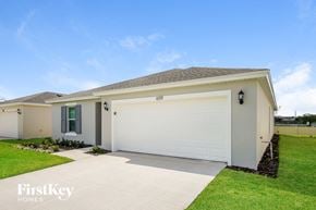 Davenport house for rent - A house with a garage door numbered 69.