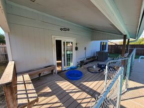 Killeen house for rent - a porch with a door and a blue bowl on the floor