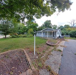Morrow house for rent - a house on the side of a street next to a sidewalk