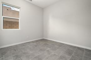 Indio house for rent - an empty room with white walls and a window