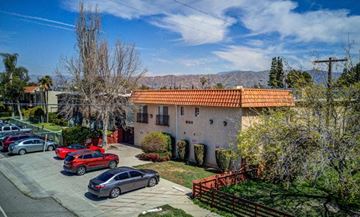 North Hollywood apartment for rent - a house with cars parked in front of it