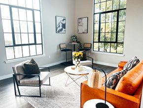 Perkasie apartment for rent - a living room with a couch and chairs and a table