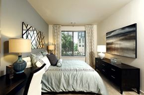 Mclean apartment for rent - a bedroom with a bed and a large window