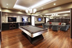 Mclean apartment for rent - a game room with a pool table and a tv