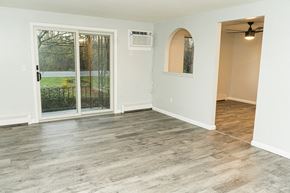 Niagara Falls apartment for rent - an empty living room with a sliding glass door