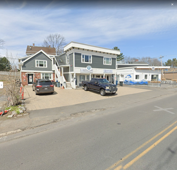 Marblehead apartment for rent - a car is parked in front of a house on a street