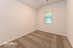 Cleveland house for rent - the bedroom of a home with carpet and a window