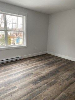 Kentville apartment for rent - an empty room with wooden floors and a window
