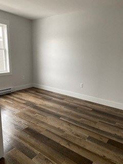 Kentville apartment for rent - a empty room with wooden floors and white walls