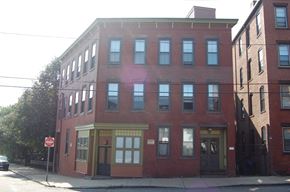 Chelsea apartment for rent - a red brick building on a city street