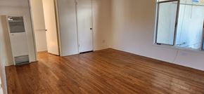 Los Angeles apartment for rent - a living room with a hard wood floor and a window
