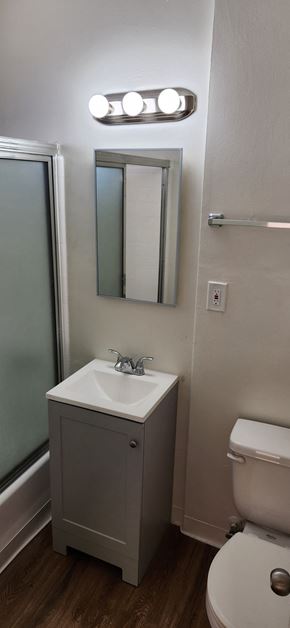 Los Angeles apartment for rent - a small bathroom with a sink toilet and a mirror