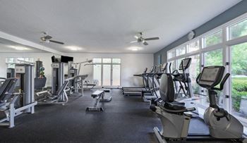 24-Hour fitness center with cardio and free weights