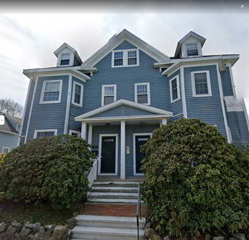 Marblehead apartment for rent - a blue house with two dormers on top of it