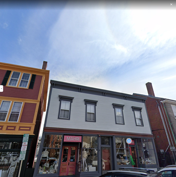 Marblehead apartment for rent - a white building and a red building on a street