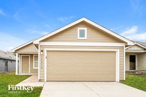 San Antonio house for rent - A house with a garage door and a window is for sale.