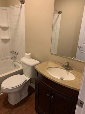Hope Mills house for rent - A white toilet sits next to a sink in a bathroom.