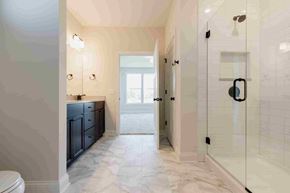 Blaine house for rent - a large white bathroom with a shower and a sink