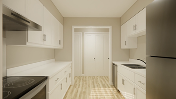 Nanaimo apartment for rent - A kitchen with white cabinets and a checkered floor.
