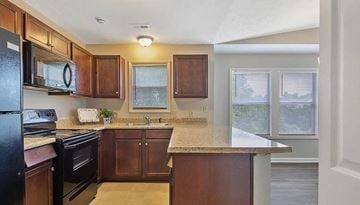 Fayetteville house for rent - a kitchen with a counter top and a sink