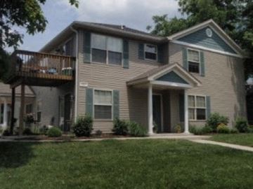 Columbia apartment for rent - a house with a balcony and a yard