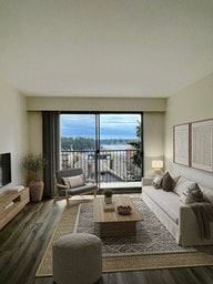 Nanaimo apartment for rent - A modern living room with a view of the ocean.