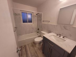 Wheat Ridge house for rent - a bathroom with a sink toilet and a bath tub