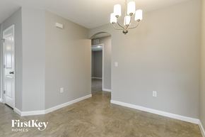 Davenport house for rent - the living room and dining room are empty and ready to be remodeled