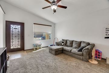 El Paso house for rent - a living room with a couch and a ceiling fan