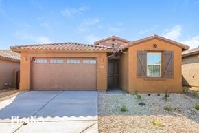 Litchfield Park house for rent - a house with a garage and a garage door