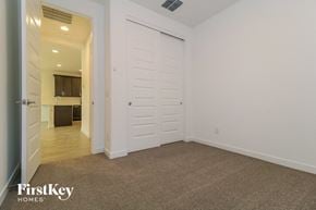 Litchfield Park house for rent - a bedroom with a closet and a door to a bathroom