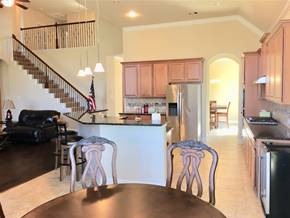 Pearland house for rent - a kitchen and dining room with a table and chairs