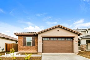 Glendale house for rent - A house with a brown garage door and a brown tiled roof.