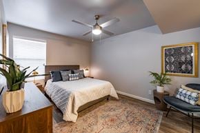 Glendale apartment for rent - a bedroom with a bed and a ceiling fan