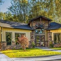 Vancouver apartment for rent - the front of a house with a lawn and trees