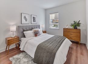 Woodbridge Township apartment for rent - a bedroom with a bed and two dressers