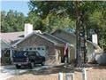 Pensacola house for rent - a house with a truck parked in front of it