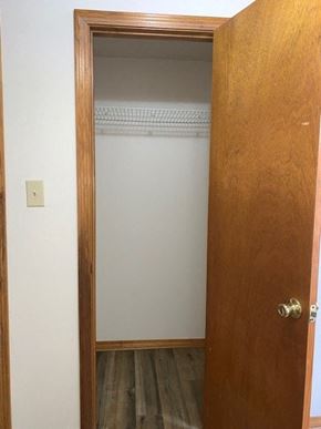 Crestview house for rent - an empty room with a door to a closet