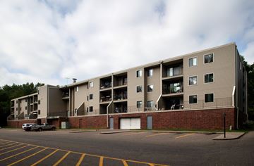 Stillwater apartment for rent - an apartment building with a car parked in front of it