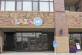 West Des Moines apartment for rent - a building with a pizza 50 sign on the front of it
