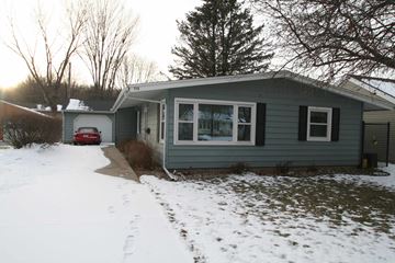 Rochester house for rent - the front of the house in the snow