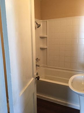 Windsor house for rent - a bathroom with a bath tub and a sink
