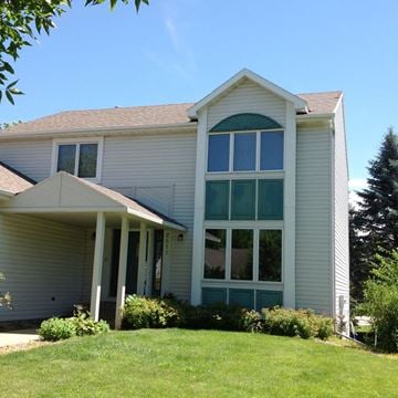 Rochester house for rent - the front of a house with large windows