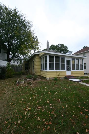 Rochester house for rent - a view of the front of the house from the yard