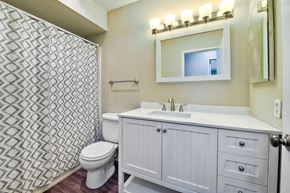 San Diego apartment for rent - a bathroom with a sink toilet and a shower