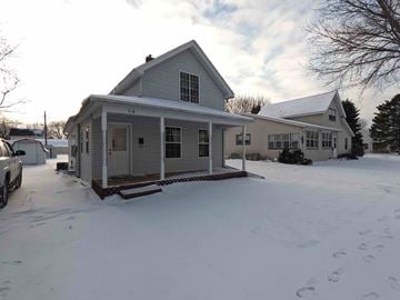 Lake City house for rent - A house with a white car parked in front of it.
