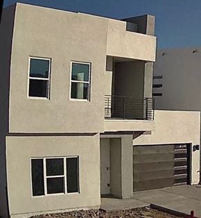 El Paso house for rent - a white building with a balcony and a staircase