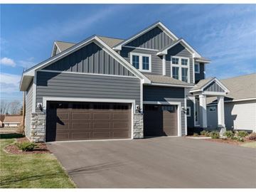 Woodbury house for rent - a house with a garage door in front of it