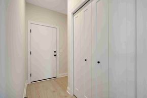 Lake Elmo house for rent - a bedroom with two closets and a door to a closet